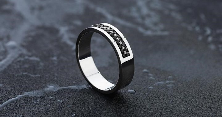 Elevate Your Look with a Black Ring Featuring a Black Diamond