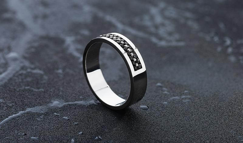 Elevate Your Look with a Black Ring Featuring a Black Diamond